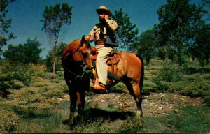 Texas Ranger On Horseback Using Walkie-Talkie