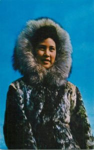 United States Eskimo girl wearing Gold leopard Seal Parka