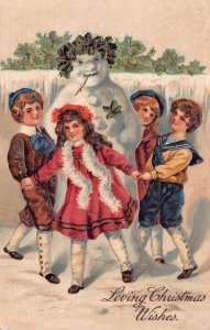 CHRISTMAS HOLIDAY SNOWMAN GARLAND CHILDREN EMBOSSED PFB POSTCARD 1908