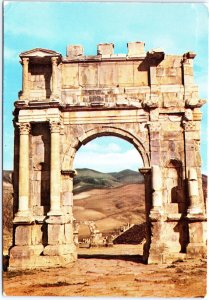 VINTAGE CONTINENTAL SIZE POSTCARD ANCIENT RUINS CARACALLA'S ARCH DJEMILA ALGERIA