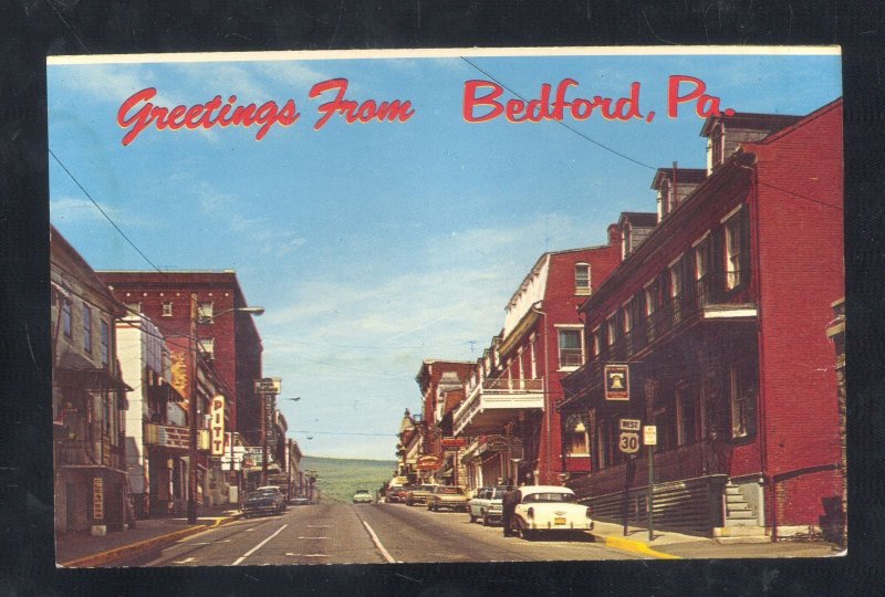 BEDFORD PENNSYLVANIA PA. DOWNTOWN STREET SCENE OLD CARS VINTAGE POSTCARD