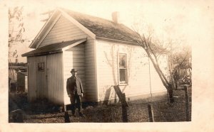 Vintage Postcard 1900s A Man Standing Outside The House Black & White RPPC Photo