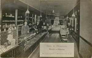 1915 RPPC G.E. Pearson Jeweler & Optician Shop Interior Elm Street Manchester NH