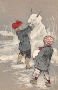 Christmas Greetings Children building Snowman Embossed Hartmann PC AA109998