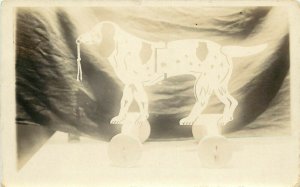 c1930 RPPC Child's Pull Toy, Spaniel or Shorthair Hunting Dog on Wheels Unk. US