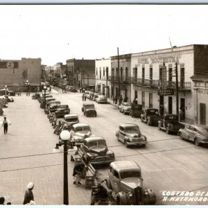 c1950s Matamoros, Tamps RPPC Downtown Cars Square Hotel Moctezuma Coca Cola A167