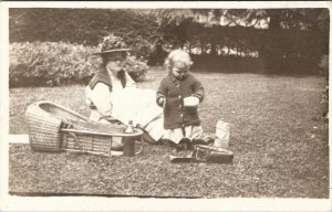 RPPC Taking Baby on Picnic with Wicker Stroller Carrier Real Photo Postcard V6