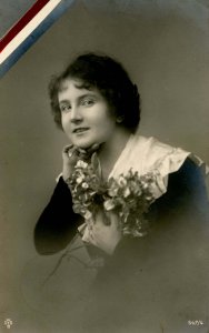 Smiling Lady-- Patriotic?    *RPPC