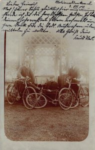 PROUD STYLISH MEN WITH BICYCLES CYCLISTS~1904 RUDEISHEIM PSTMK PHOTO POSTCARD