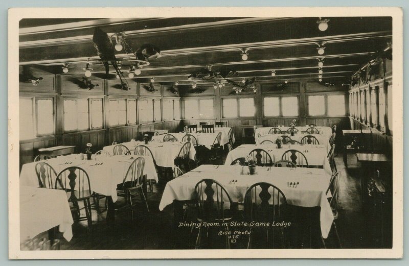 Custer SD Dining Room~Trophies Hang From Ceiling Lamp~State Game Lodge~RPPC 1934 