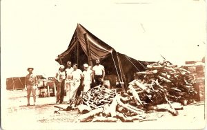 RPPC Postcard Tent Military Scene Pile of Wood c1918