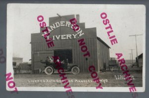 Manderson WYOMING RPPC c1910 LIVERY STABLE Advertising GARAGE nr Greybull WY