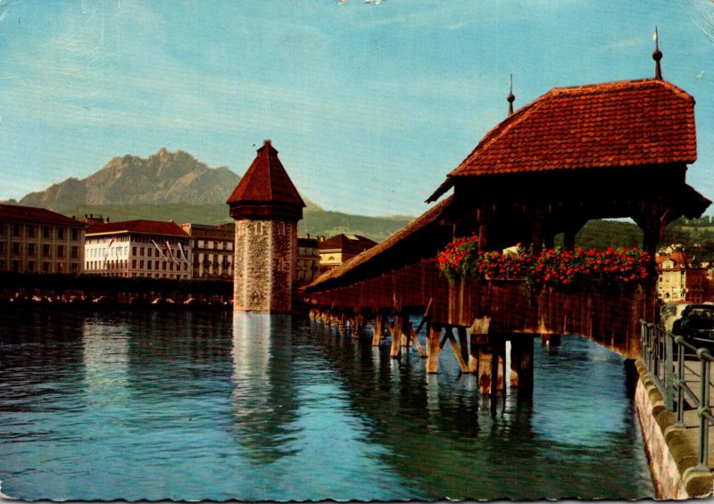 Switzerland Luzern Chapel Bridge With Water Tower and Pilatus