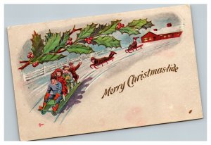 Vintage 1908 Christmas Postcard Cute Children in Sled Mistletoe Holly Berries