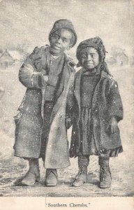 SOUTHERN CHERUBS CHILDREN IN SNOW BLACK AMERICANA POSTCARD (c. 1900)