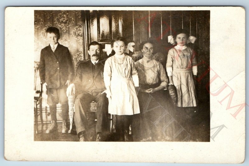 c1910s Lovely Group Family Indoors RPPC Photo Children Boy Girl Grandparent A174