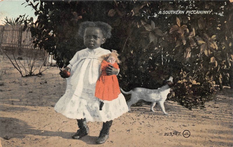 A SOUTHERN GIRL IN DRESS WITH HER DOLL & DOG BLACK AMERICANA POSTCARD (c. 1910)