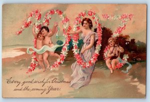 1907 Christmas Floral Large Numbers Cherub Playing Lyre Embossed PFB Postcard
