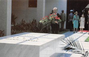 President Carter places a floral wreath on the tomb of a late Yugoslavia lead...