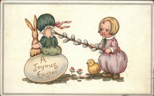 Easter Boy Tickles Little Girl with Pussy Willow Fantasy c1910 Postcard