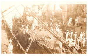 WW 1  Loading Coal on ship , by hand