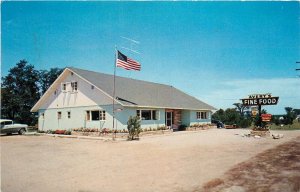 Postcard 1959 Michigan Mancelona Avery's Restaurant flag autos MI24-3970