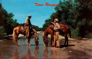 Texas Rangers With Horses Drinking