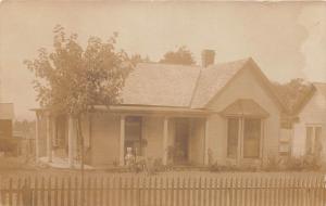 YOUNG GIRL IN FRONT OF COTTAGE  POSSIBLY CEDAR GROVE TN REAL PHOTO POSTCARD