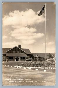 LAND'O'LAKES WI KINGS GATEWAY HOTEL ANTIQUE REAL PHOTO POSTCARD RPPC w/ US FLAG