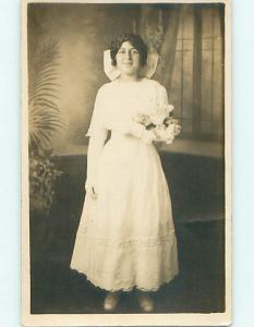 Pre-1918 rppc PRETTY GIRL WITH BOW IN HAIR HOLDS ROSE FLOWERS r5832