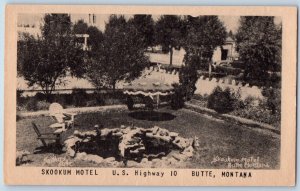 Butte Montana MT Postcard Skookum Hotel U.S highway 10 Garden Scene Antique