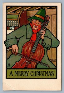 CHRISTMAS VIOLIN PLAYER ARTIST SIGNED TUCK ANTIQUE POSTCARD by G.W.MASON