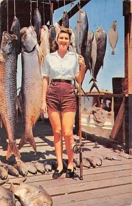 Woman with a Pole and Fish Hanging Behind Her Fishing PU Unknown 