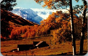 Vtg Autumn in the Colorado Rockies Farm Scene Snow Covered Mountains CO Postcard