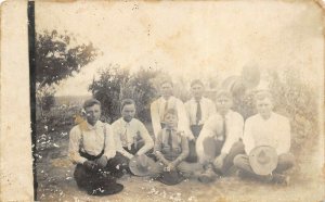 Taiton Texas c1910 RPPC Real Photo Postcard Seated Men Boys Cowboy Hats