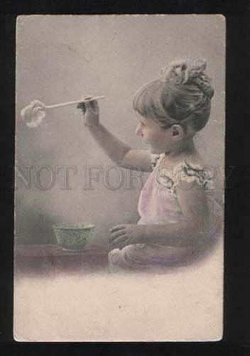 057383 Lovely Girl playing SOAP BUBBLES vintage Photo Tinted