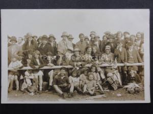Group Photograph at Event Seated behind fence Union Jack Flag & Flowers Old RPPC