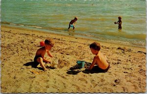 Greetings From Oshawa Ontarion Canada Children Playing On The Beach