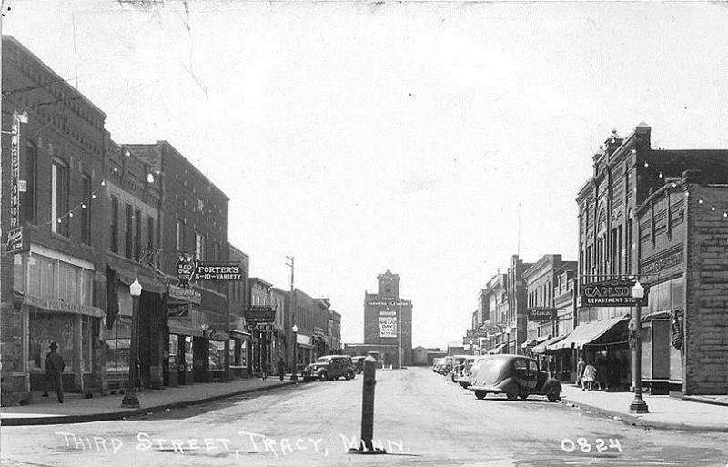 Tracy MN Storefronts Old Cars in 1940 RPPC Postcard