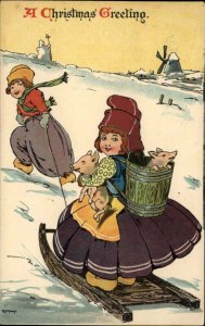 A/S George Nister 335 Christmas Dutch Children Piglets Sledding c1910 Postcard