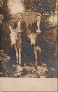 Two Men on Mules at Rocks Beneath the Cliff c1910 Real Photo Postcard Y13