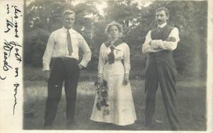 Chicago Illinois Group Photo Woman Flowers Men 1911 RPPC Photo Postcard 12967