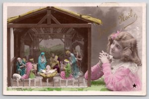 Christmas RPPC Child Admires Nativity Set Colored Stebbing Photo Postcard L35