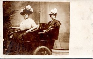 RPPC PMO 1907-1915 Two women in Fancy hats posing in car