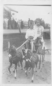 Young boy & girl on a carriage ride Child, People Photo Unused 