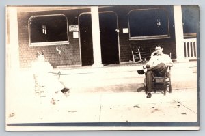 RPPC  Couple Outside Restaurant in Rocking Chairs   Postcard