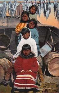 Alaska Nome Eskimo Familty With Fish Drying