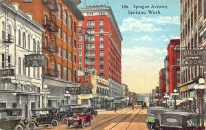 Spokane WA Sprague Avenue Storefronts Trolley Tracks Old Cars Postcard.