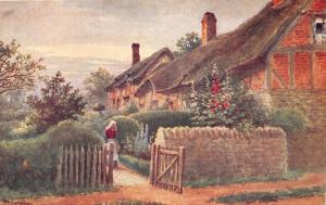 STRATFORD UK ANNE HATHAWAY COTTAGE~WOMAN IN GARDEN~ARTIST QUATRAMAIN POSTCARD