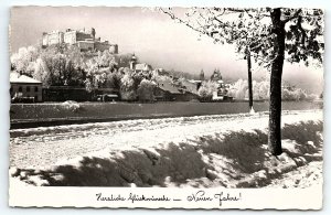 1950s SALZBURG AUSTRIA FORTRESS HOHENSALZBURG HAPPY NEW YEAR RPPC POSTCARD P162